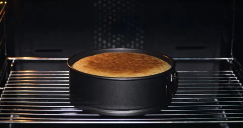 Baking cakes in the oven. Stock Footage 132348322