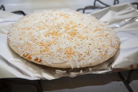 Baking Cheese Pizza Stock Photos