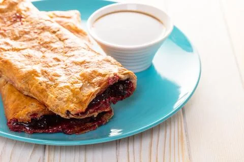 Baking, cherry strudel in a plate Foto stock