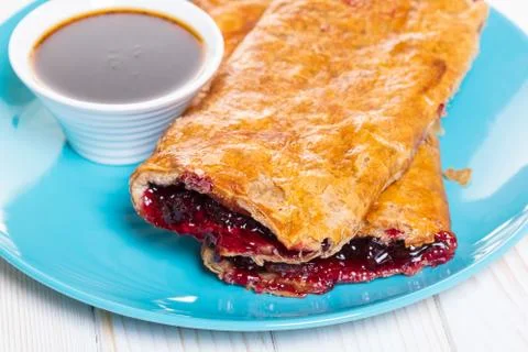 Baking, cherry strudel in a plate Stock Photos