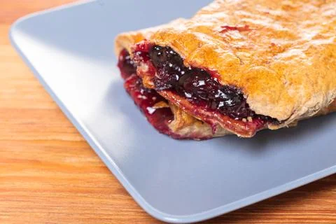 Baking, cherry strudel in a plate Stock Photos