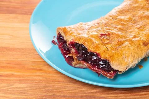 Baking, cherry strudel in a plate Stock Photos