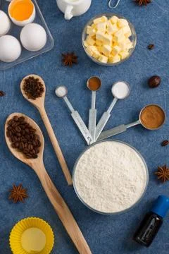 Baking composition eggs flour butter spices kitchen tools Stock Photos