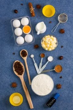 Baking composition eggs flour milk butter spices kitchen tools Stock Photos