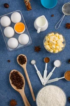 Baking composition eggs flour milk butter spices kitchen tools Stock Photos