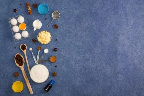 Baking composition eggs flour milk butter spices kitchen tools Stock Photos