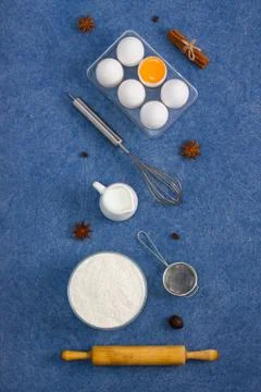 Baking composition eggs flour milk spices kitchen tools Stock Photos