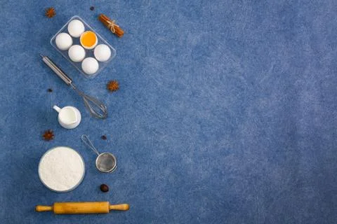 Baking composition eggs flour milk spices kitchen tools Stock Photos