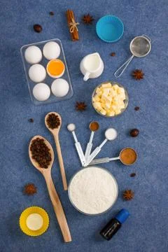 Baking composition eggs flour milk butter spices kitchen tools Stock Photos