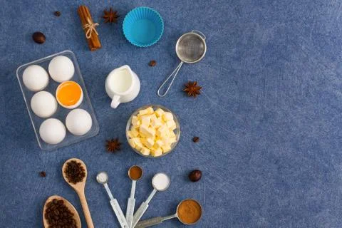 Baking composition eggs milk butter spices kitchen tools Stock Photos