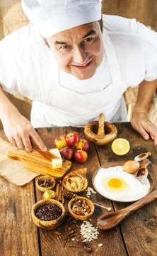 Baking concept background. Baker with ingredients for pastry desserts. Apples Stock Photos