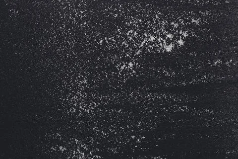 Baking concept on black background, sprinkled flour with copy space Stock Photos