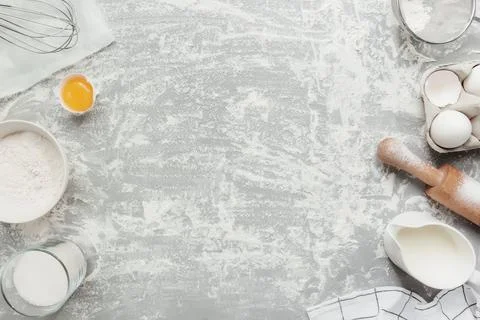 Baking concept flat lay. Ingredients, kitchen utensils, grey concrete backg.. Stock Photos