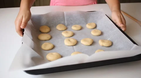 Baking cookies going to the oven    Stock Footage 54641158