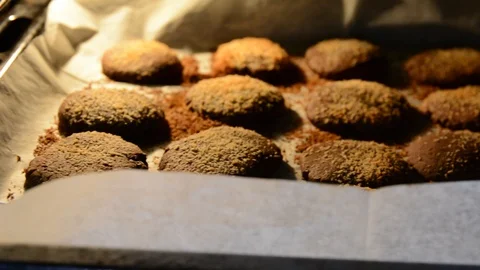 Baking cookies in the oven. close up low light 動画素材 119086177
