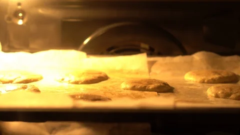 Baking cookies in the oven, timelapse Stock Footage 128796405
