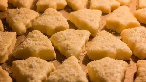 Baking cookies in the shape of a Christmas tree Stock Footage 70142839