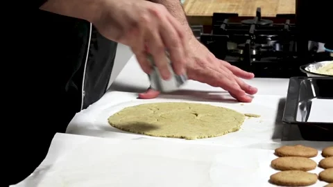 Baking delicious cookies in a cozy kitchen with a creative touch and warm Stock Footage 317735631