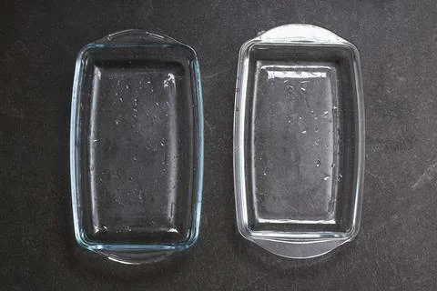 A baking dish cleaned from thick layer of carbon. Glassware for baking after Stock Photos