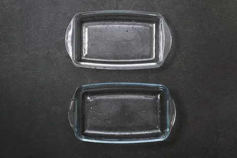 A baking dish cleaned from thick layer of carbon. Glassware for baking after Stock Photos