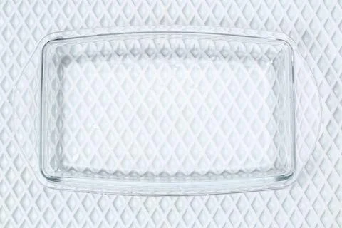 A baking dish cleaned from thick layer of carbon. Glassware for baking after Stock Photos