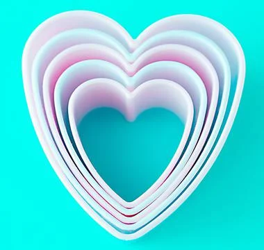 Baking dish in the form of hearts on a blue background, concept photo, symbol Stock Photos