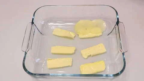 In a baking dish lay the potato slices Stock Footage 165234801