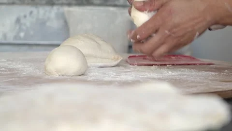 Baking dough in a lively kitchen environment Stock Footage 317735765