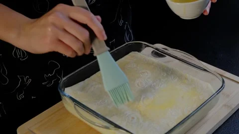 Baking Dough with Pastry Brush in Cooking Kitchen Video stock 341450332