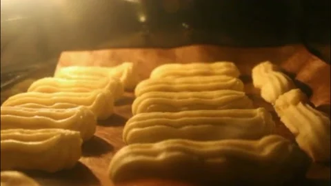 Baking eclairs timelapse. Fresh bakery. Speed ​​up video. Video stock 220105836