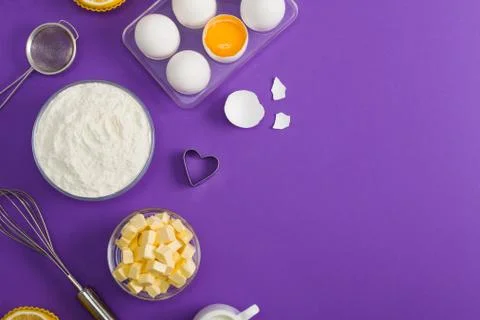Baking flat lay background with eggs floor butter lemon muffins Stock Photos