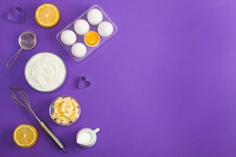 Baking flat lay background with eggs floor butter lemon muffins Stock Photos
