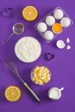 Baking flat lay background with eggs floor butter lemon muffins Stock Photos