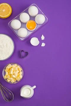Baking flat lay background with eggs floor butter lemon muffins Stock Photos