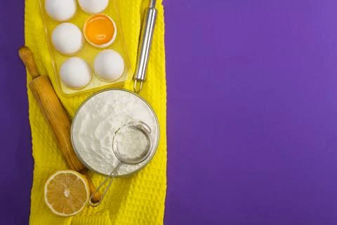 Baking flat lay composition with eggs yolk floor and lemon Stock Photos