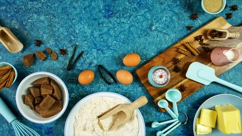 Baking flatlay creative composition for chocolate recipes on vintage blue table. Stock Footage 129789832
