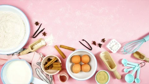 Baking flatlay creative composition top view for basic recipes on pink table. Video stock 129789771