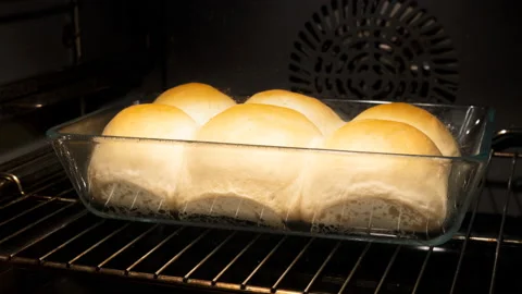 Baking of fluffy dinner bread rolls Stock Footage 145535225