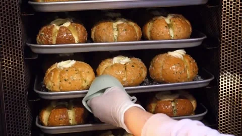 Baking Fresh Korean Cream Cheese Garlic Bread in Commercial Oven Video stock 343587455