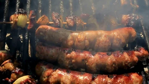 Baking fresh meat on grill Stock Footage 73901794