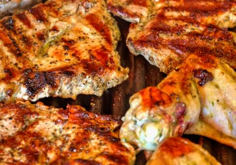 Baking fresh meat on grill Stock Photos