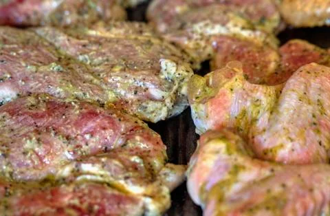 Baking fresh meat on grill Stock Photos