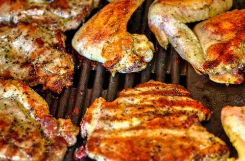 Baking fresh meat on grill Stock Photos
