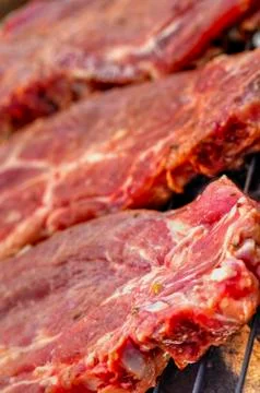 Baking fresh meat on grill Stock Photos