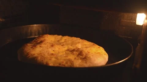 Baking homemade bread in oven until golden brown Stock Footage 301402888