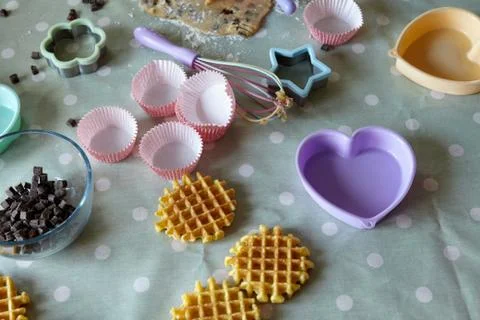 Baking implements in messy kitchen Stock Photos
