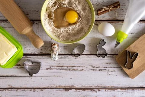 Baking ingredients for baking Easter cookies - flour, eggs, cinnamon, butter, Stock Photos