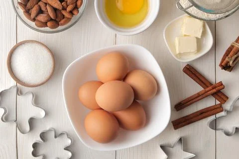 Baking ingredients. baking tools. butter, eggs, sugar, milk, cinnamon, almond Stock Photos