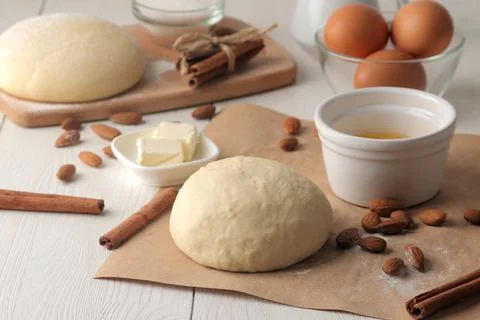 Baking ingredients. baking tools. dough and butter, eggs, sugar, milk, cinnam Stock Photos