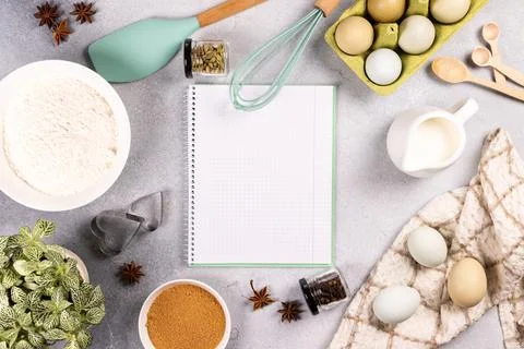Baking ingredients with blank notebook for recipe Stock Photos